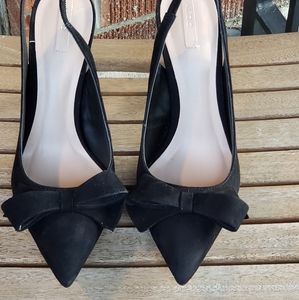 Black suede slingback dress pump with bows